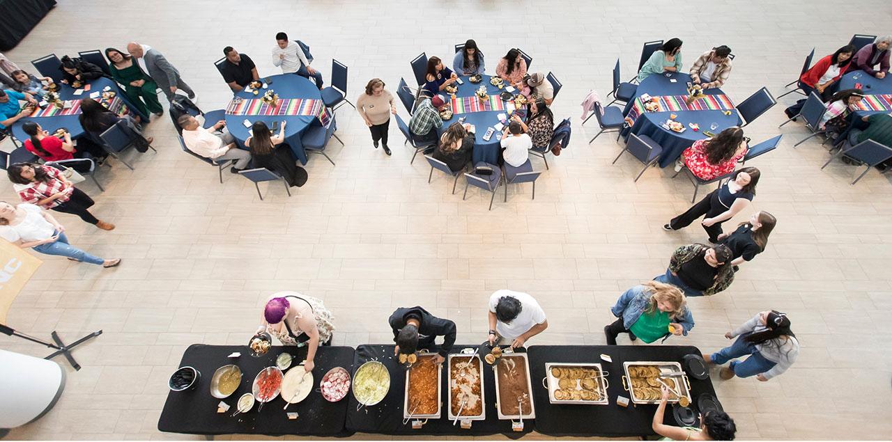 Cenit shot of a table with food and other tables with people